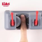 ⁦حامل مكانس 3عين+4هوك ماركة ليو⁩ - الصورة ⁦2⁩